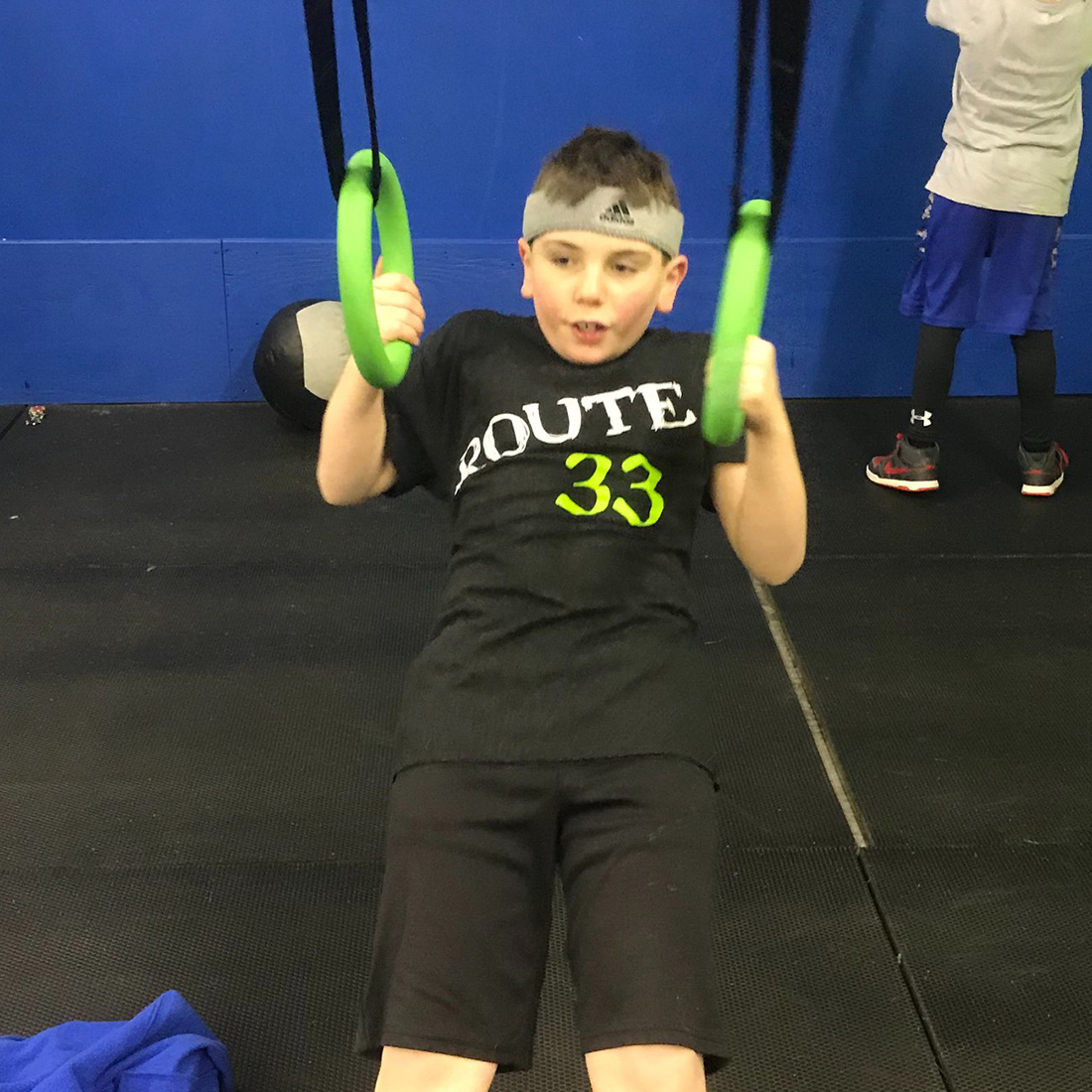 kid climbing rope